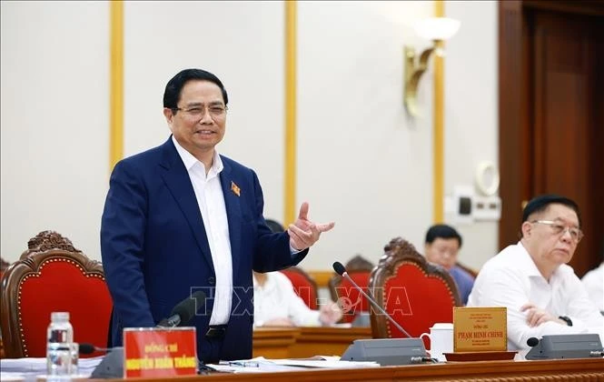 El primer ministro Pham Minh Chinh habla en la reunión. (Foto: VNA)