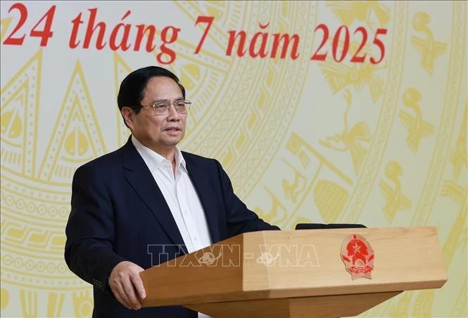 El primer ministro de Vietnam, Pham Minh Chinh, habla en la reunión. (Fuente: VNA)