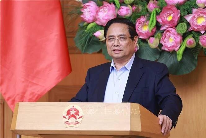 El primer ministro de Vietnam, Pham Minh Chinh, preside la cita (Foto: VNA)