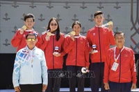 Cuatro atletas, incluidos Nguyen Huy Hoang, Vo Thi My Tien, Nguyen Kha Nhi y Mai Tran Tuan Anh, tienen un desempeño excelente y ganan la medalla de oro. (Fuente: VNA)
