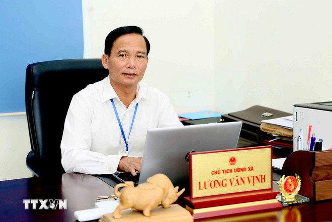 El presidente del Comité Popular de la Comuna de Huoi Mot, Luong Van Vinh. (Fuente: VNA) van-kien-trinh-dai-hoi-xiv-cua-dang-8360002.jpg