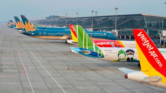 Retrasos en los vuelos debido al clima y a la sobrecarga de infraestructura en muchos aeropuertos. (Foto: Vietnam+) may-bay-hang-k-10082021-2597.jpg