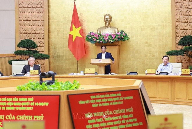 El primer ministro Pham Minh Chinh interviene en la Conferencia de Gobierno para difundir y resumir la implementación de la Resolución n.º 18-NQ/TW, efectuada el 4 de diciembre en Hanoi. (Fuente: VNA) 24-10-53-53.jpg