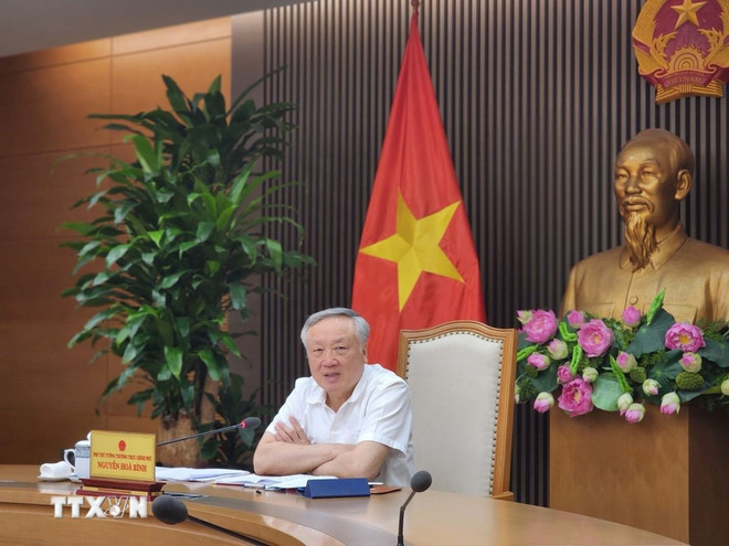 El viceprimer ministro vietnamita, Nguyen Hoa Binh, interviene en el evento. (Fuente: VNA) img-9144.jpg