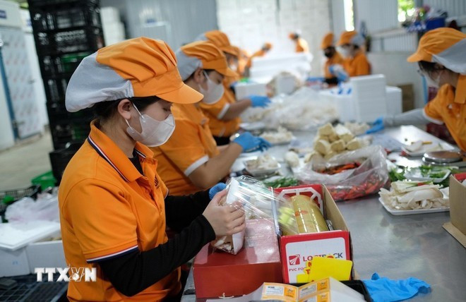 La Resolución 68 ha impulsado el espíritu emprendedor, fomentado la toma de riesgos y fomentado una mayor colaboración entre el gobierno y las empresas. (Foto: VNA) anh-minh-hoa-ttxvn.jpg