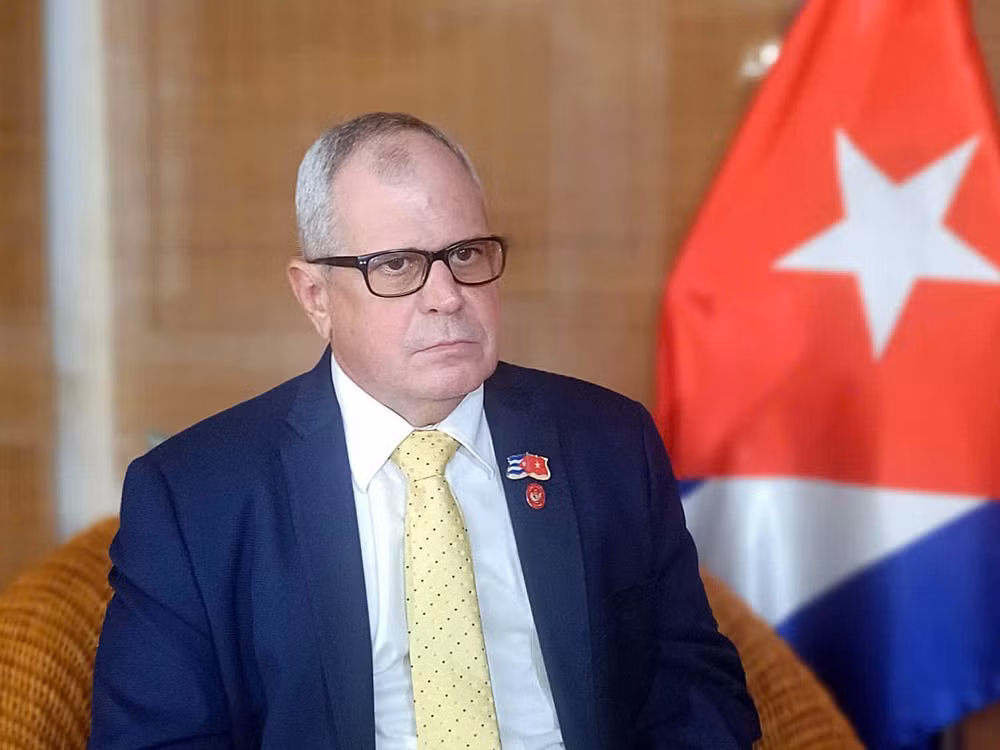 vna-potal-tong-thu-ky-quoc-hoi-va-hoi-dong-nha-nuoc-cuba-homero-acosta-alvarez-tra-loi-phong-van-phong-vien-8312476.jpg