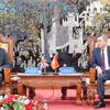 El ministro de Finanzas vietnamita, Ngo Van Tuan, y el embajador británico en Hanoi, Ian Frew, en el encuentro. (Fuente: mof.gov.vn)