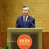 El ministro de Finanzas, Ngo Van Tuan, presenta el informe de verificación. (Foto: VNA)