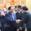 El primer ministro de Vietnam, Pham Minh Chinh, y las empresas japonesas. (Foto: VNA)