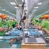 Línea de montaje de productos terminados en la fábrica de Bandai Vietnam. (Foto: VNA)
