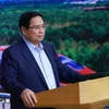 El primer ministro de Vietnam, Pham Minh Chinh, habla en la reunión. (Fuente: VNA)