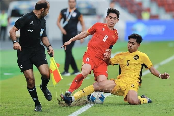 Selección de fútbol de Vietnam asegura su pase a semifinales. (Foto: VNA)