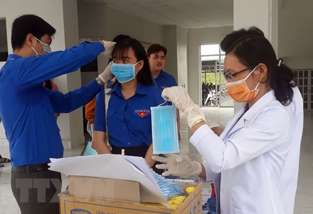 Garantizará sector textil vietnamita seis millones de mascarillas en febrero ảnh 1