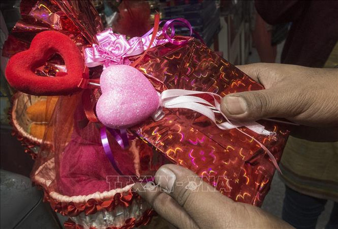 Festejan en Vietnam Día de San Valentín pese a propagación de COVID-19 ảnh 1 Festejan en Vietnam Día de San Valentín pese a propagación de COVID-19 ảnh 1