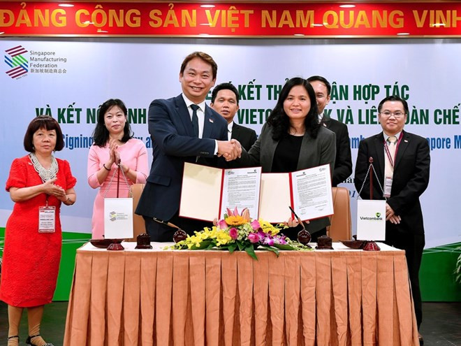 Vietcombank logra acuerdo con Federación de Manufactura de Singapur ảnh 1 Vietcombank logra acuerdo con Federación de Manufactura de Singapur ảnh 1