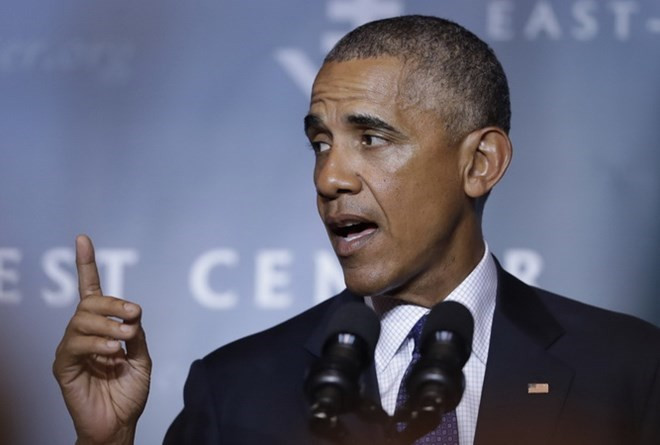 Barack Obama asiste a cumbres de ASEAN en Laos ảnh 1 Barack Obama asiste a cumbres de ASEAN en Laos ảnh 1