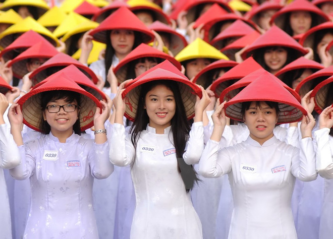 [Galería] Miles de estudiantes desfilan con Ao Dai en Ciudad Ho Chi Minh ảnh 5