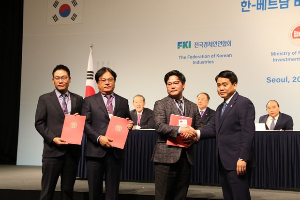Hanoi intercambia documentos de cooperación con Corea del Sur ảnh 1 Hanoi intercambia documentos de cooperación con Corea del Sur ảnh 1