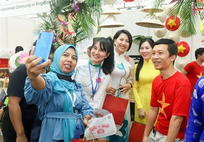 Huella de Vietnam en Día Internacional del Migrante en Singapur ảnh 1 Huella de Vietnam en Día Internacional del Migrante en Singapur ảnh 1