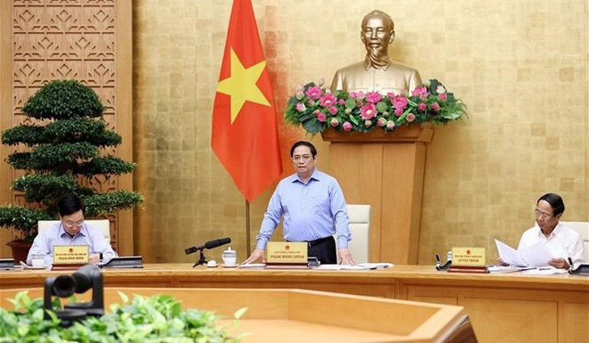 Premier vietnamita preside reunión del Gobierno sobre situación socioeconómica ảnh 1 Premier vietnamita preside reunión del Gobierno sobre situación socioeconómica ảnh 1