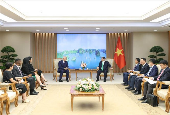Premier pide a Standard Chartered apoyar a Vietnam en transición energética sostenible ảnh 1