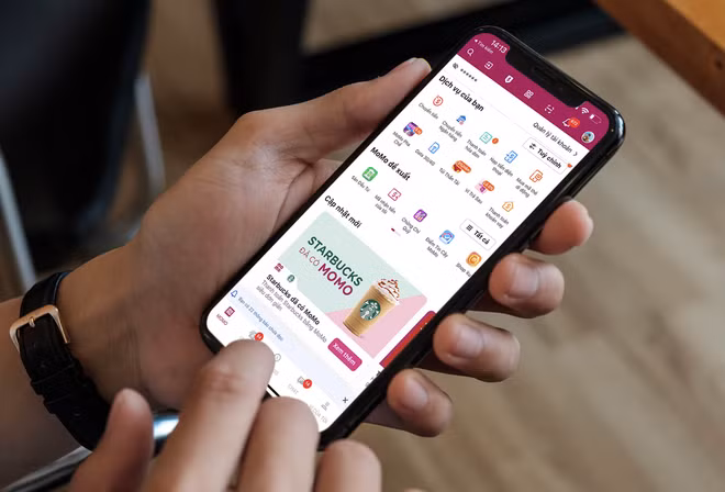 Momo deviene primera e-billetera para el pago en cadena de Starbucks Vietnam ảnh 2