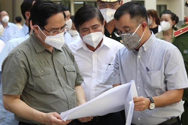 Primer ministro de Vietnam dirige lucha contra el COVID-19 en Ciudad Ho Chi Minh ảnh 2 Primer ministro de Vietnam dirige lucha contra el COVID-19 en Ciudad Ho Chi Minh ảnh 2