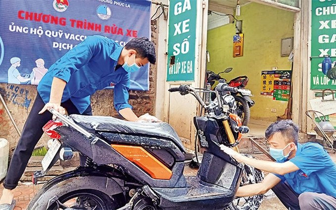 Jóvenes de Hanoi aportan al Fondo de Vacunas contra el COVID-19 ảnh 1