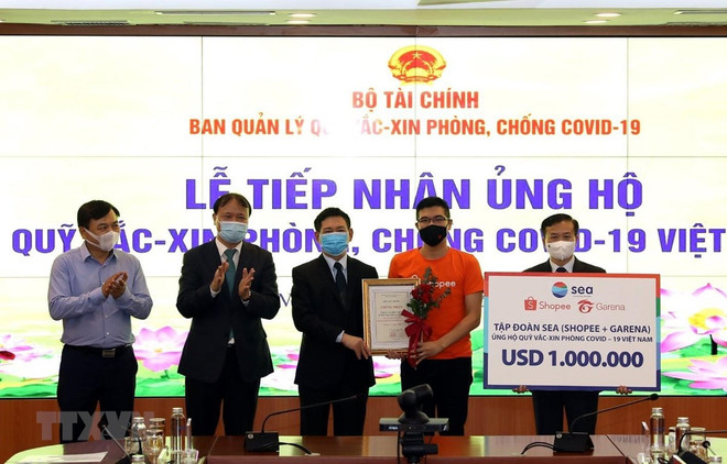 Recaudan 353 millones de dólares para fondo de vacunas contra el COVID-19 en Vietnam ảnh 1