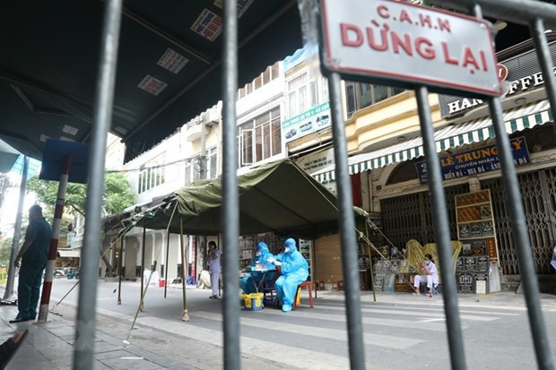 Suspenderá Hanoi servicios no esenciales para frenar el COVID-19 ảnh 1