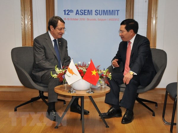 Vicepremier y canciller de Vietnam continúa con agenda apretada al margen de ASEM ảnh 1 Vicepremier y canciller de Vietnam continúa con agenda apretada al margen de ASEM ảnh 1