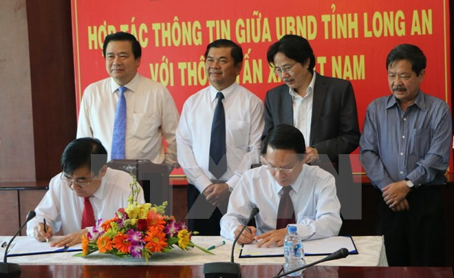 Firman acuerdo de cooperación informativa entre VNA y Long An ảnh 1 Firman acuerdo de cooperación informativa entre VNA y Long An ảnh 1
