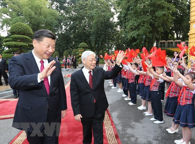 Líderes vietnamitas y chinos intercambian felicitaciones por Año Nuevo Lunar ảnh 1 Líderes vietnamitas y chinos intercambian felicitaciones por Año Nuevo Lunar ảnh 1