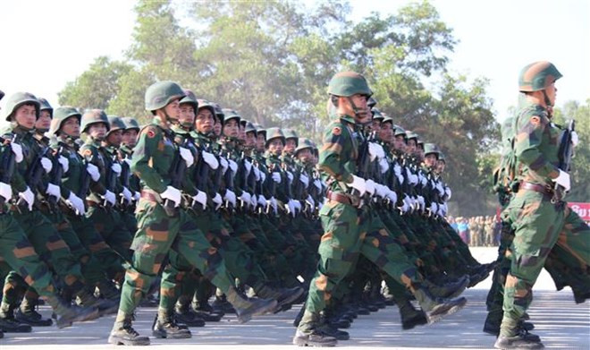 Conmnemoran en Laos el 70 Aniversario de la fundación del Ejército Popular ảnh 1 Conmnemoran en Laos el 70 Aniversario de la fundación del Ejército Popular ảnh 1