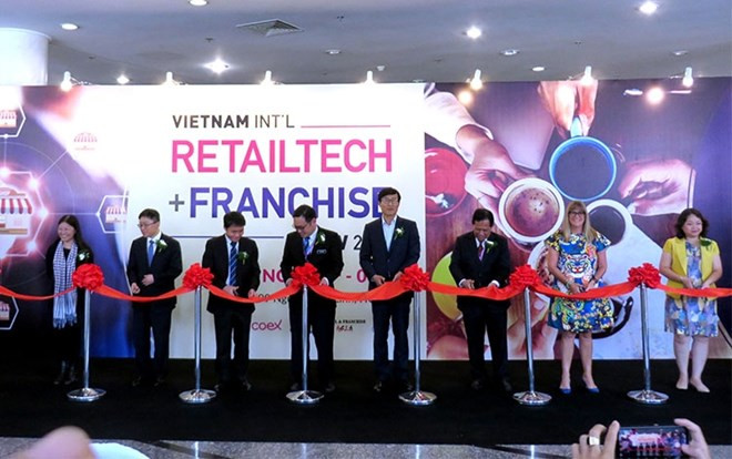 Efectúan en Ciudad Ho Chi Minh exposiciones internacionales de franquicia y de café ảnh 1
