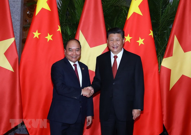 Premier vietnamita dialoga con secretario general del Partido y presidente chino ảnh 1 Premier vietnamita dialoga con secretario general del Partido y presidente chino ảnh 1