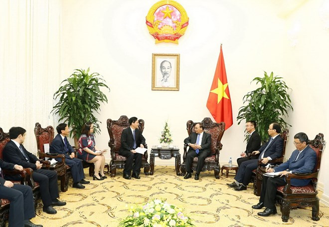 Premier vietnamita dialoga con dirigentes empresariales chinos ảnh 1