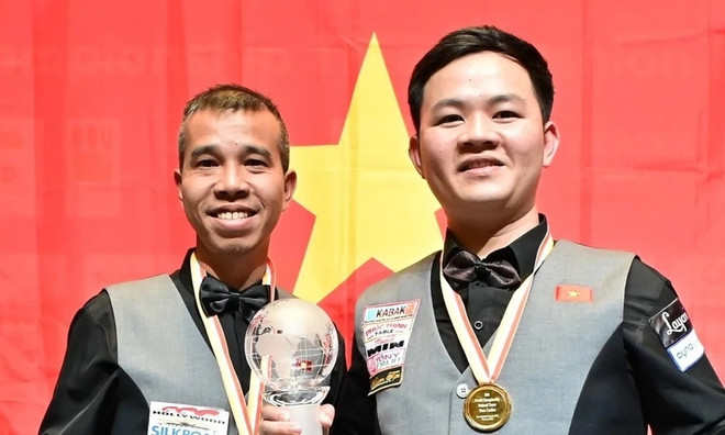 Equipo vietnamita gana título mundial de billar ảnh 1
