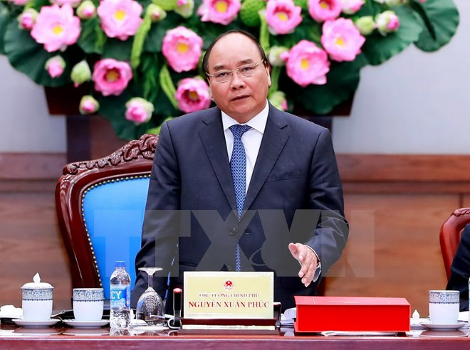 Regalan arroz a vietnamitas necesitados en ocasión del Tet ảnh 1