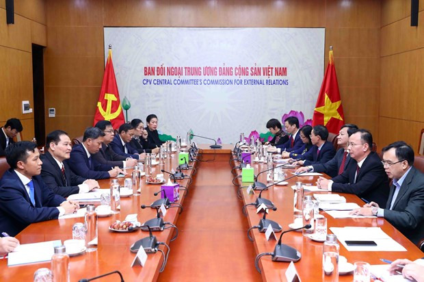 Vietnam y Laos comparten experiencia de movilización de masas ảnh 1