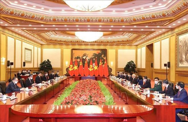 Visita de máximo digigente partidista vietnamita a China ayuda a promover la amistad bilateral ảnh 1 Visita de máximo digigente partidista vietnamita a China ayuda a promover la amistad bilateral ảnh 1