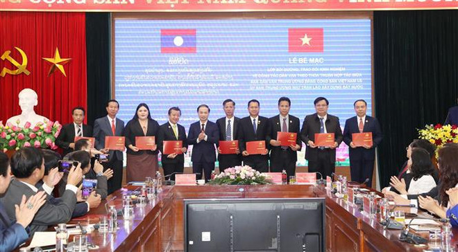 Vietnam y Laos intercambian experiencias en movilización de masas ảnh 2