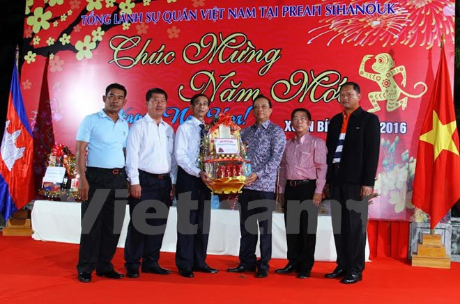 Compatriotas vietnamitas celebran Tet en distintos países ảnh 1 Compatriotas vietnamitas celebran Tet en distintos países ảnh 1