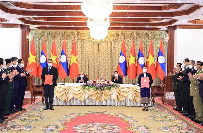 Presidente vietnamita se reúne con máximo dirigente de Laos ảnh 2