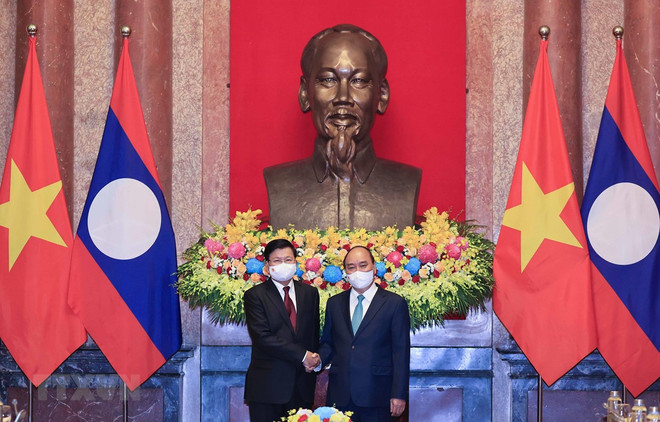 Visita del presidente de Vietnam a Laos evidencia solidaridad especial binacional ảnh 1