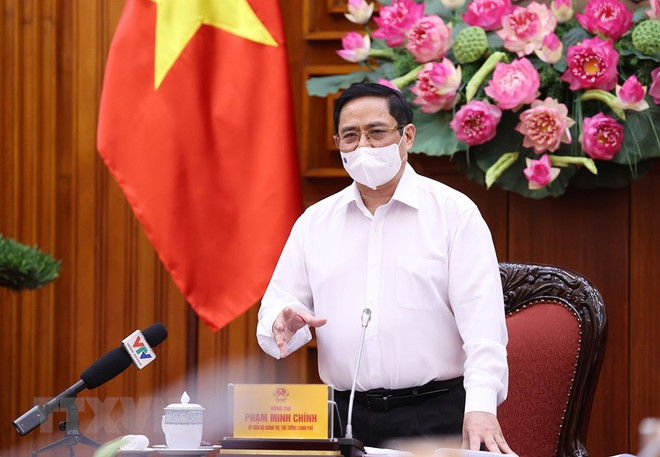 Pide premier de Vietnam establecer fondo para vacunación antiCOVID-19 ảnh 1