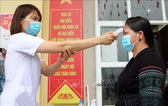 Vietnam sigue reforzando la lucha contra el COVID-19 en medio de elecciones legislativas ảnh 1