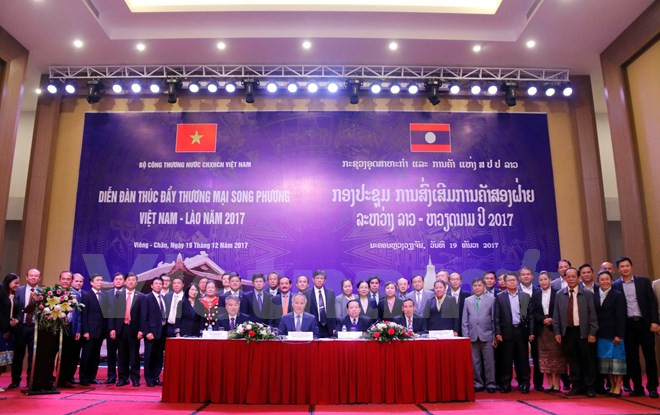 Foro en Vientiane busca impulsar comercio entre Vietnam y Laos ảnh 1 Foro en Vientiane busca impulsar comercio entre Vietnam y Laos ảnh 1