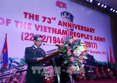 Conmemoran en Laos aniversario de Fundación del Ejército Popular de Vietnam ảnh 1 Conmemoran en Laos aniversario de Fundación del Ejército Popular de Vietnam ảnh 1