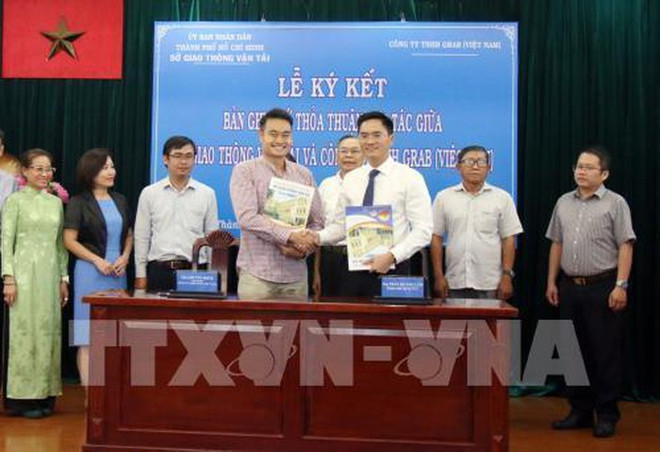 Cooperarán Ciudad Ho Chi Minh y la empresa Grab en construcción de sistema inteligente de tráfico ảnh 1